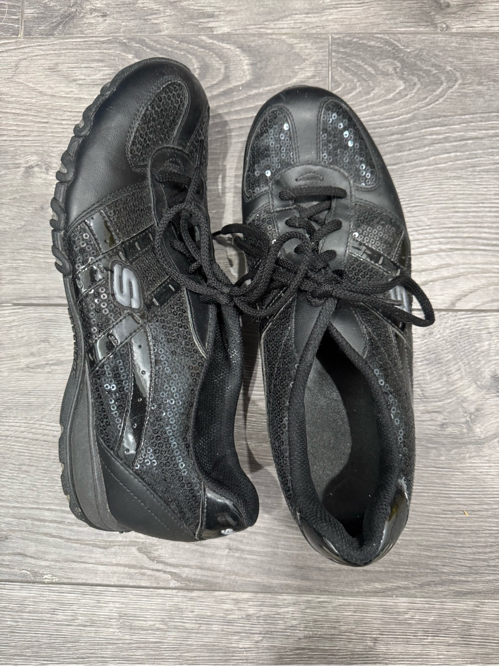 Skechers sparkly black shoes.